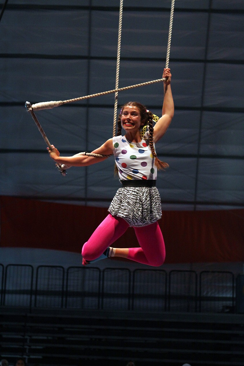 Gabrielle Ment, of Acrobrats from New York, NY, showed off her trapeze skills during American Youth Circus Organizationâ€™s showcase performance Thursday, Aug. 18 inside the PAL Sailor Circus Arena.