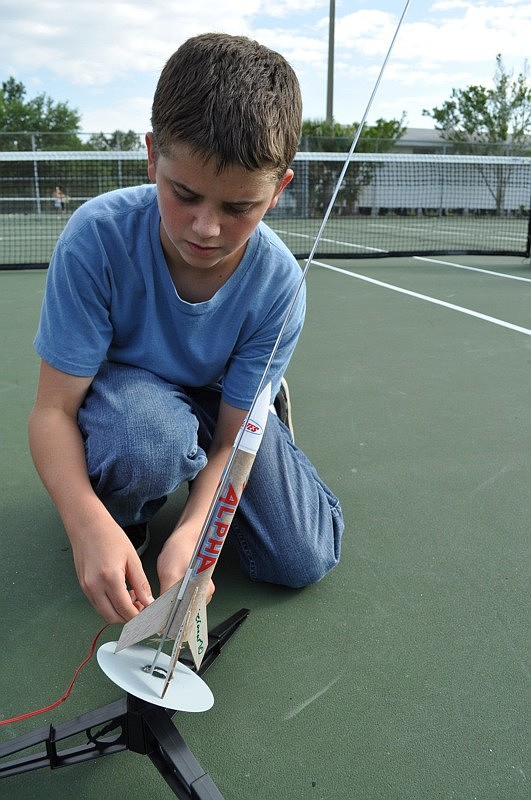 Trevor Williams, 13, readies to launch his rocket.