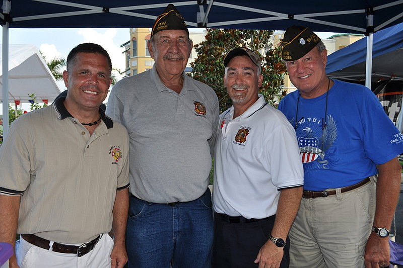 Members of VFW Post 12055 distributed Buddy Poppies. Pictured are Sgt. Maj. Steve Valley, Frank Royer, Dave Daily and Dennis King.