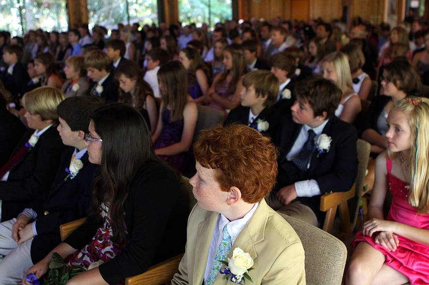 The graduating students sit in their seats Friday, June 3 during ODA's 6th grade graduation at Siesta Key Chapel.