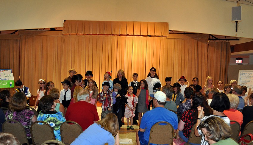 Parents, siblings and friends applaud for all the campers Friday, June 24 during the Drama Kids Playhouse camp show day at the First Congregational United Church of Christ.