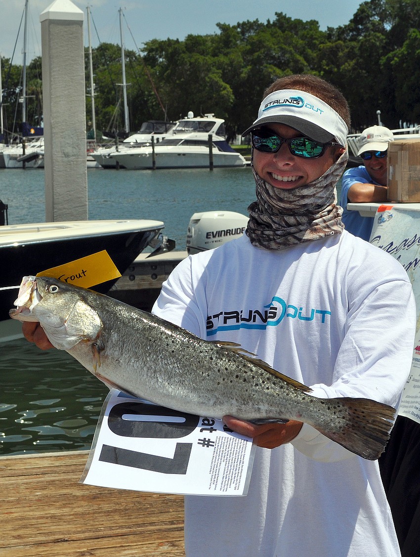 Ryan Shannon shows off his 4.67 lbs. trout that he caught.