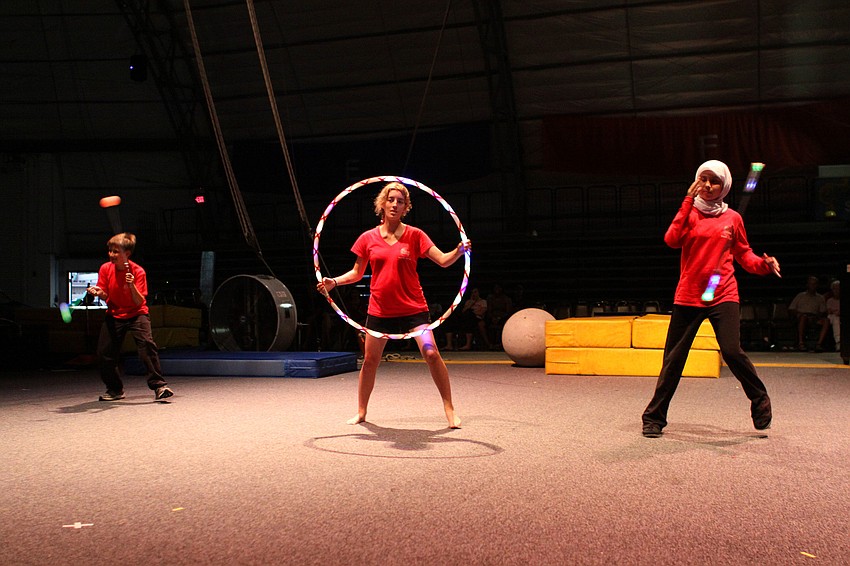 Tony Nelson, Natalie Roenker and Samiya Shamma of My Nose Turns Red Youth Circus from Cincinnati, OH performed Thursday, Aug. 18 inside the PAL Sailor Circus Arena.