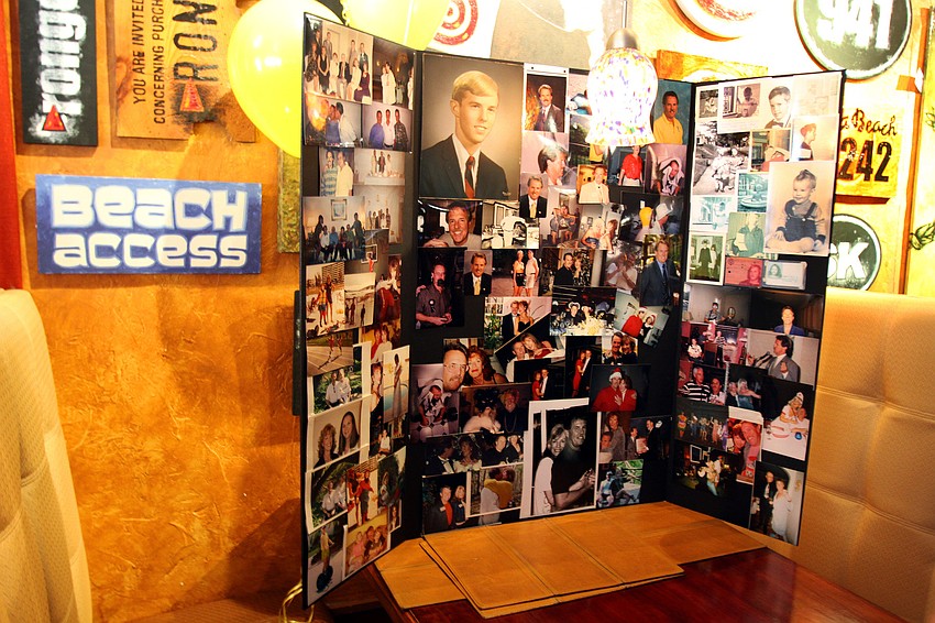 A poster board full of old photos of Tamara and Jim Ley was quite a hit at the party.