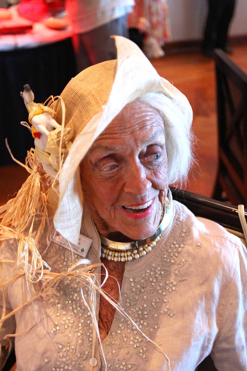 Joanna Hastings poses wearing her homemade hat on Saturday, May 7 at the Kentucky Derby party at the Sarasota Yacht Club.