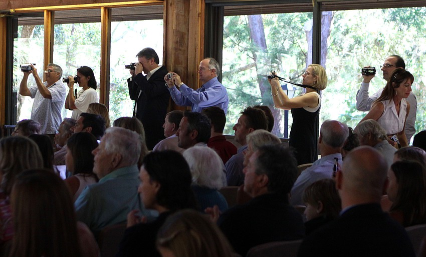 Parents stood off to one side to photograph and record their child Friday, June 3 during ODA's 6th grade graduation at Siesta Key Chapel.