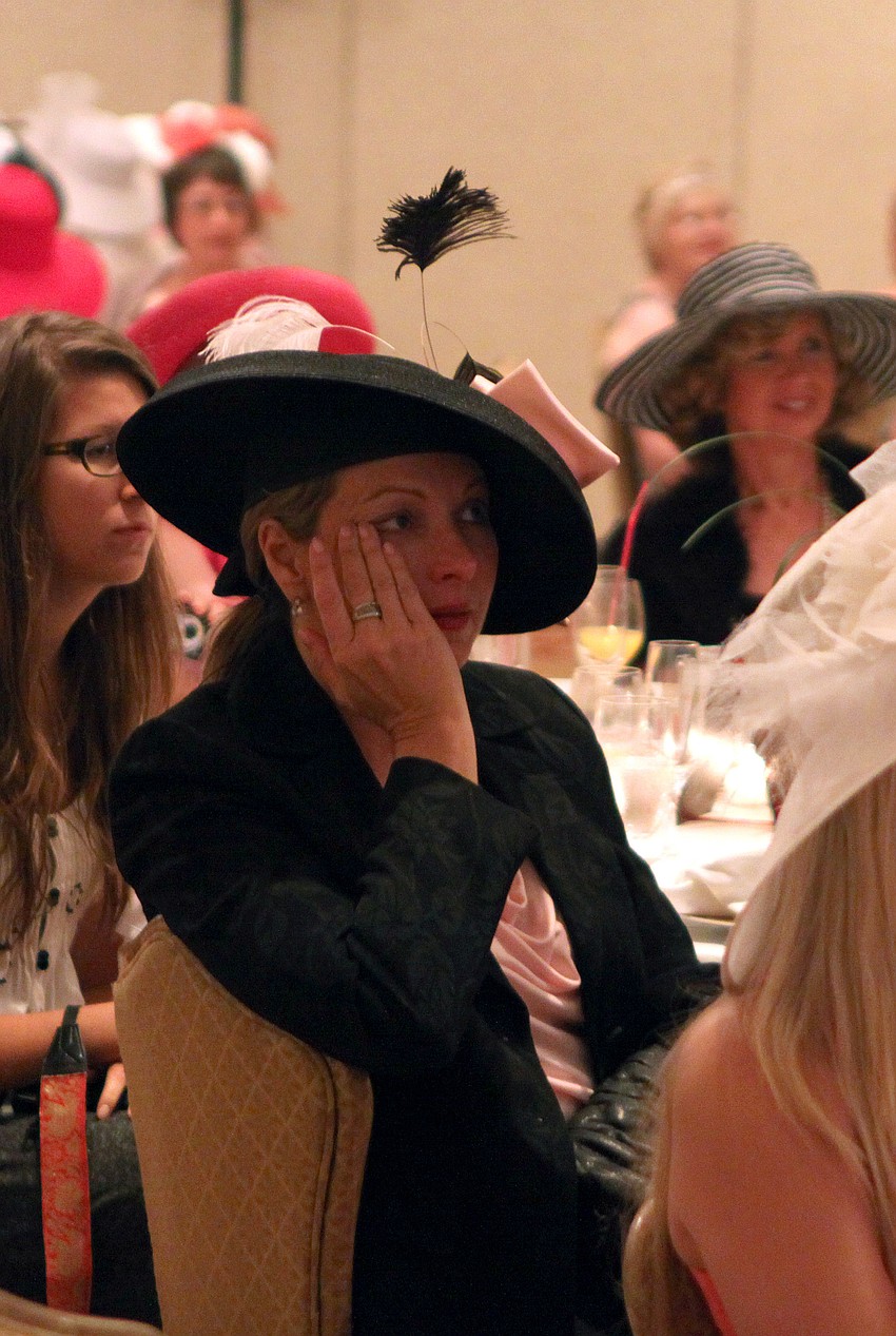 Suzanne Willis wipes a tear from her cheek while watching the royal wedding Friday, April 29 at the Ritz Carlton.
