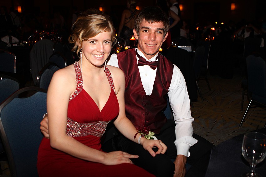 Emilee Batcheler and Tyler Doughty pose together while taking a break from the dance floor.