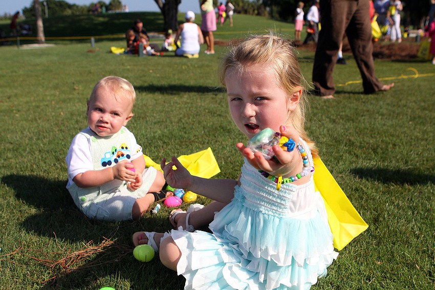 Lina Nietz, 7, shows off some of the candy she got inside the Easter eggs she found Sunday, April 24 at Longboat Key Club. Lina and her brother, Liam, both participated in the Easter egg hunt.