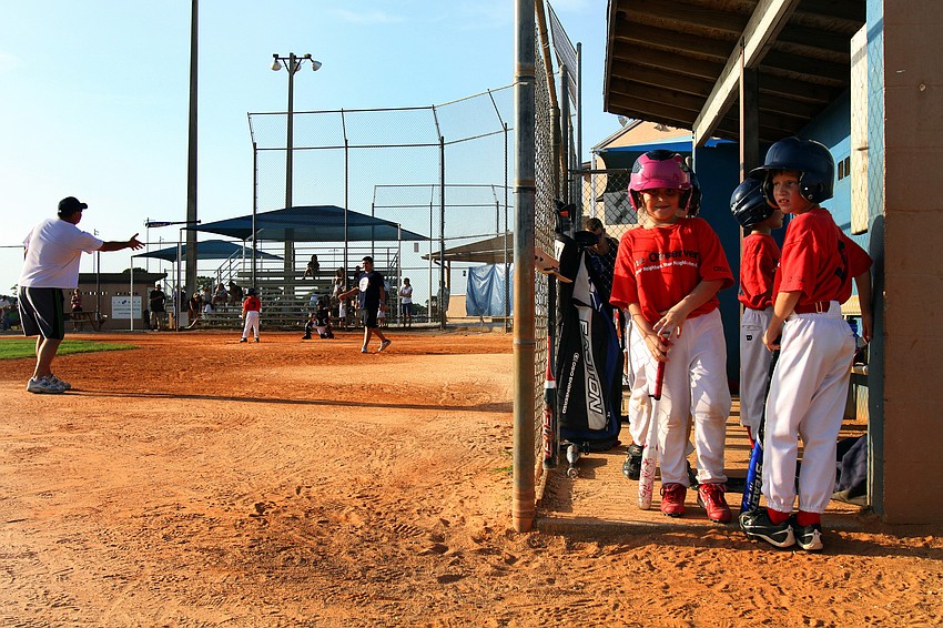 The Observer team gets ready to start the top of the next inning.