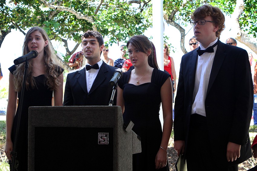 Madison Spahn, Henry Pires, Jordan Carlson and Retley Locke, the Pineview High School Quartet, sing the National Anthem Monday, May 30 at the Honoring Our Fallen Heroes Memorial Day ceremony.