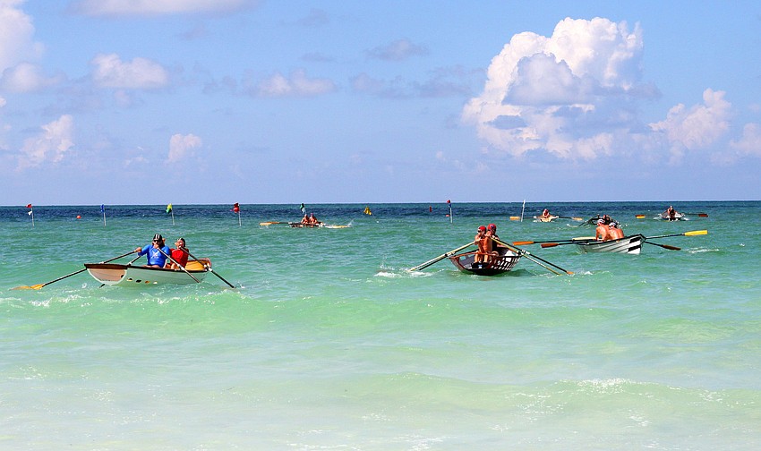 A handful of dories head out into the Gulf of Mexico Thursday, July 14 during the 2011 James 