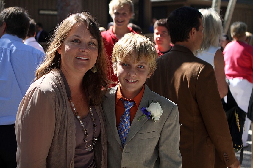 Jacob Flanders poses with his mom, Jennifer, Friday, June 3 after ODA's 6th grade graduation at Siesta Key Chapel.