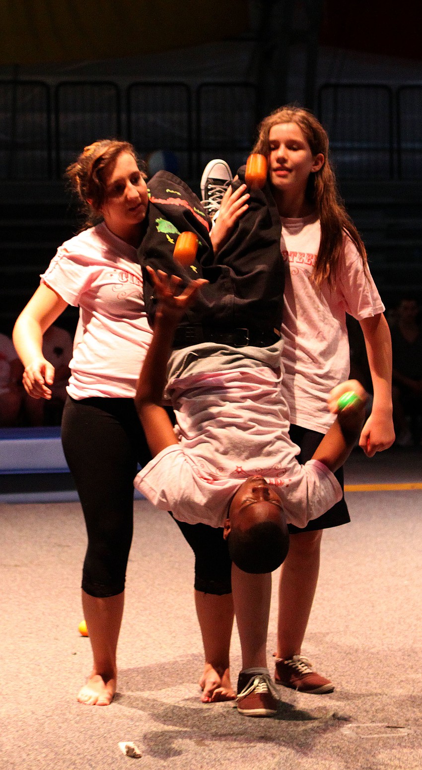 Three members of Circesteem and the Chicago Youth Circus of Chicago, IL, show off their juggling skills Thursday, Aug. 18 inside the PAL Sailor Circus Arena.