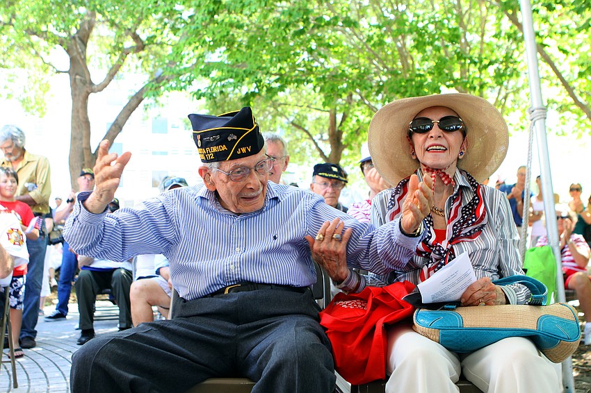 Ted Oxman, 96 1/2, with his wife, Harriett, was called out for being one of the oldest veterans in attendance Monday, May 30 at the Honoring Our Fallen Heroes Memorial Day ceremony that took place following the parade.