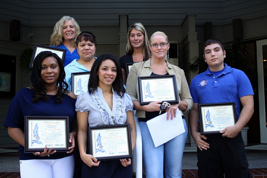 The winners of the Kiwanis technical institute scholarships pose together Thursday, Aug. 18 on the steps by The Grill.