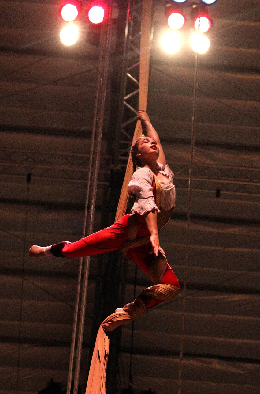 Shena Tschofen of Circus Juventas of St. Paul, MN played Little Red Riding Hood in the silks act she performed in for the American Youth Circus Organizationâ€™s showcase performance Thursday, Aug. 18 inside the PAL Sailor Circus Arena.