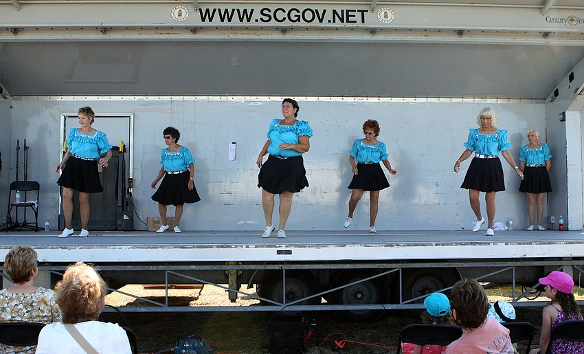 The Gulf Coast Cloggers tapped to 