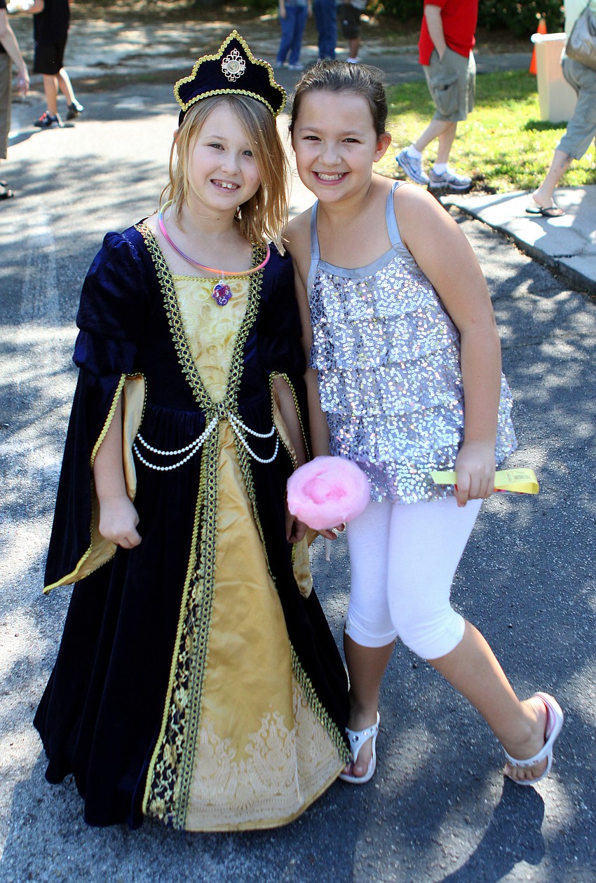 Rachael Hirsch, 9, and Juliana Maggard, 9, pose together on Sunday, March 20 at Temple Emanu-El's Purim Carnival.