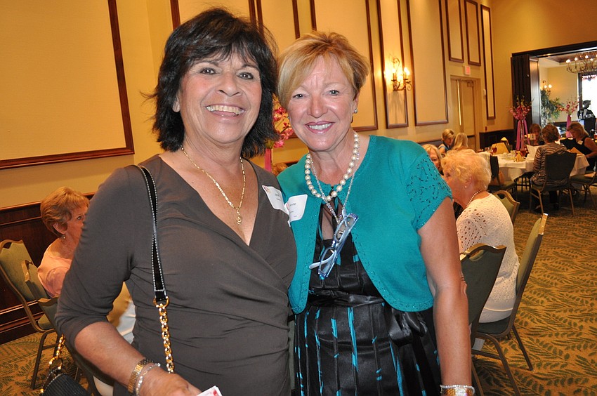 Jan Neitlich and Anne Toms play golf together.