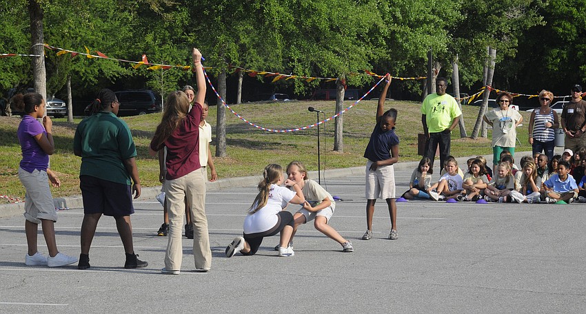 The Super Girls did several group tricks.