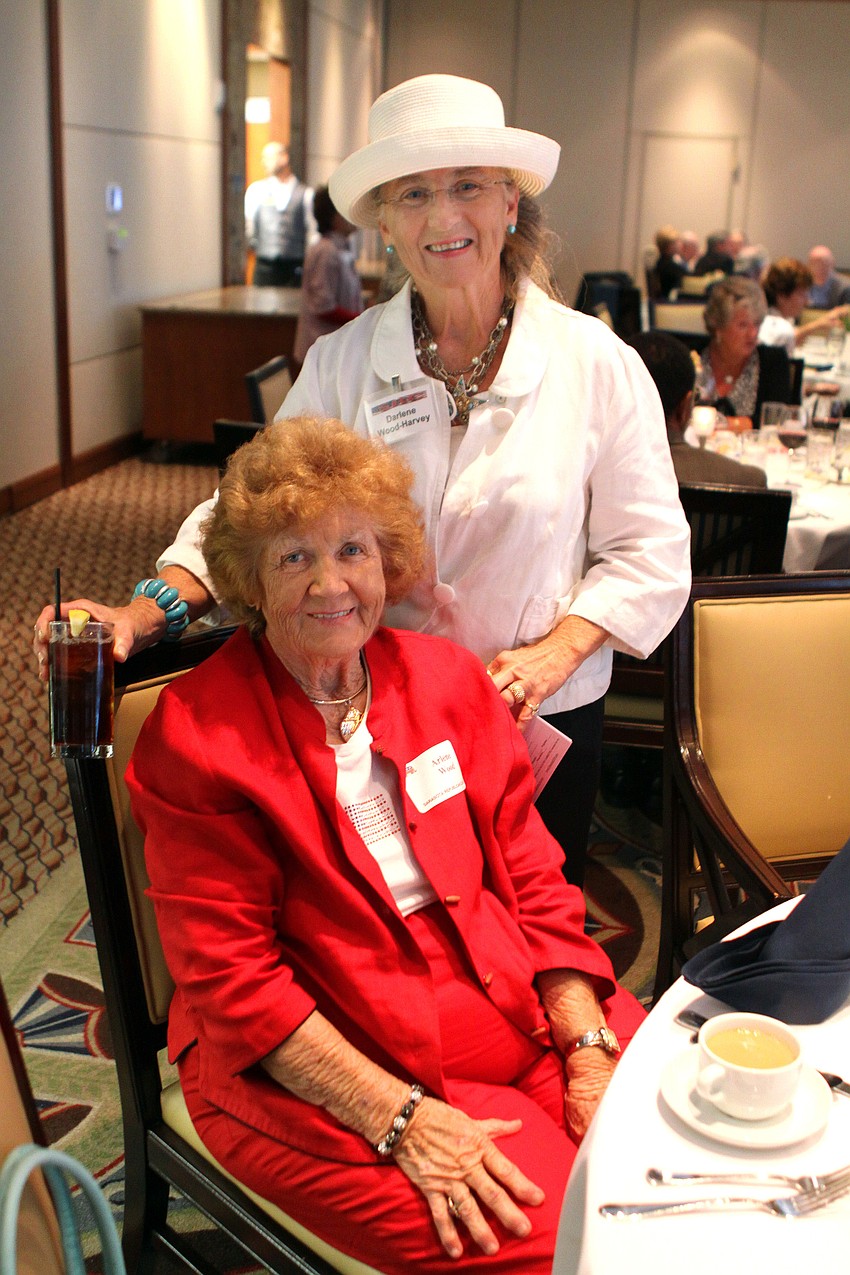 Darlene Wood-Harvey stands behind her mother, Arlena Wood, on Thursday, March 31 during the monthly dinner meeting of the Sarasota Republican Club at the Sarasota Yacht Club.