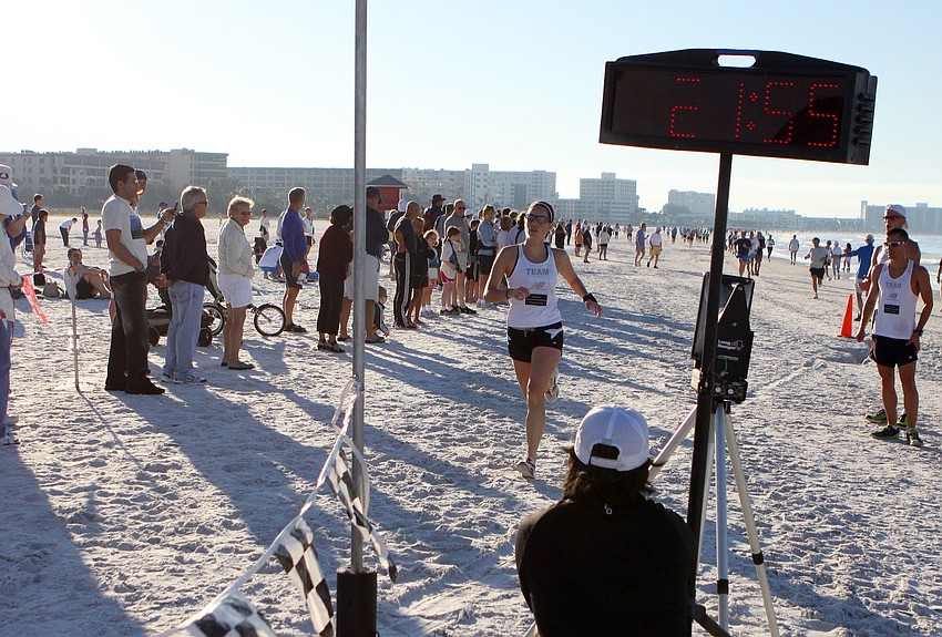 Hannah Hintz makes her way back to the finish line on Saturday, April 2 during the 25th Annual Run for the Turtles on Siesta Key Beach.
