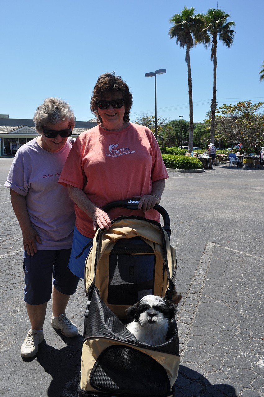 Mollie's not shopping. She's just along for the ride with Lee Cox and Mary Jones.