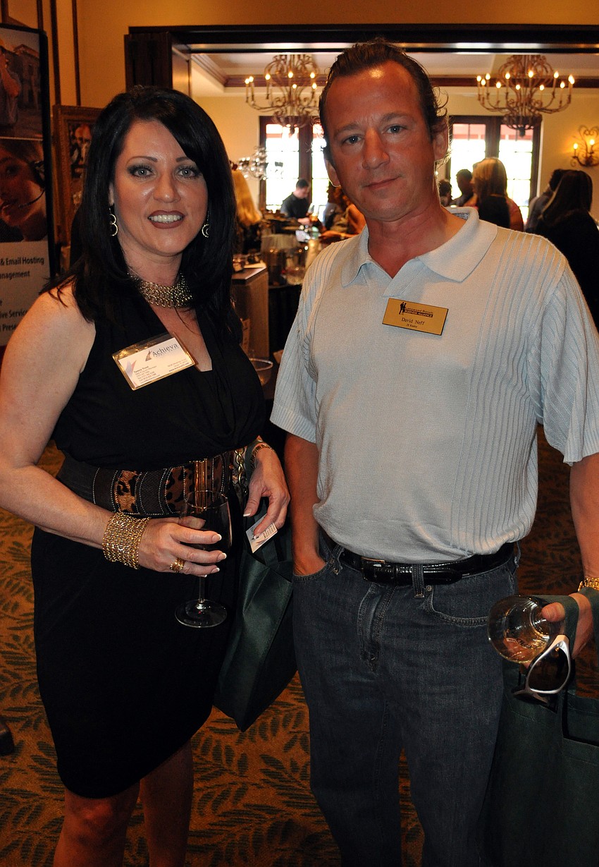 Tammy Youst of Achieva Credit Union and David Neff of JS Realty.