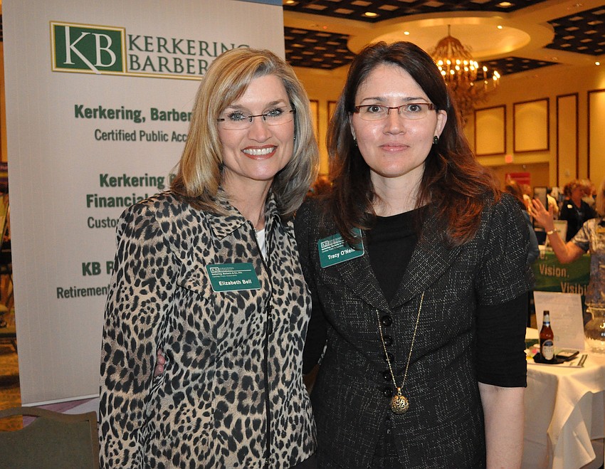 Elizabeth Bell and Tracy O'Neill worked Kerkering Barbarino Financial's booth.