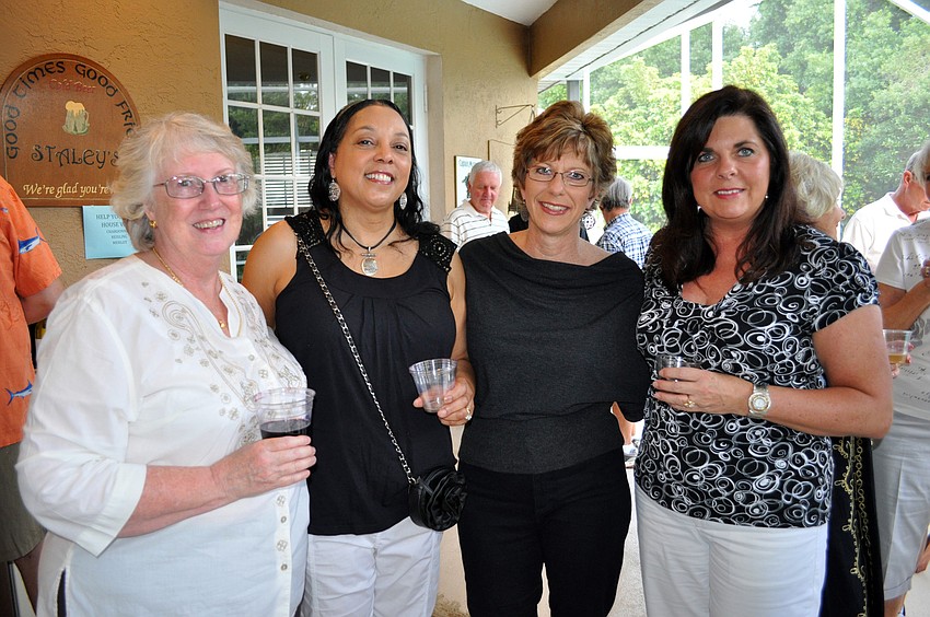 Nancy Schleicher, Cynthia Witsell, Kim Schubert and Renee Zigich are all neighbors.
