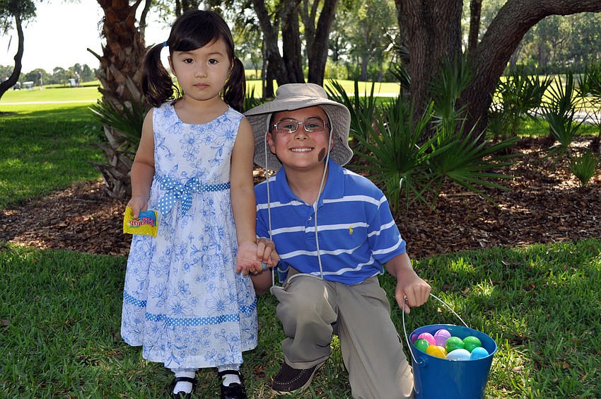 Three-year-old Georgia Mak and her brother Alexander, 9, enjoyed their neighborhood's Easter Egg Hunt.
