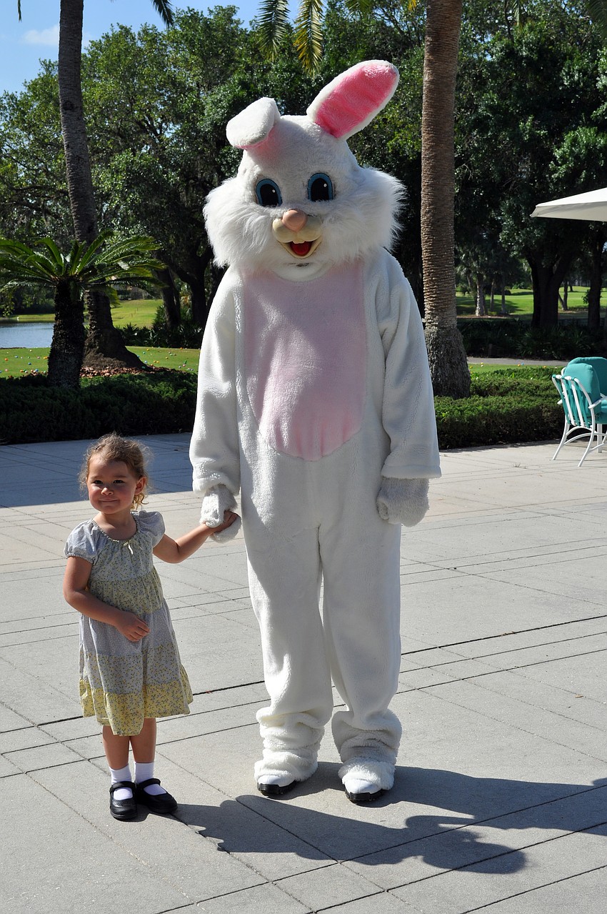 Leah Sibley, 3, made sure to stop and see the Easter Bunny before the hunt.