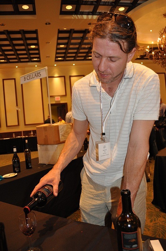 Andrew Carini of Carini Winery pours samples.