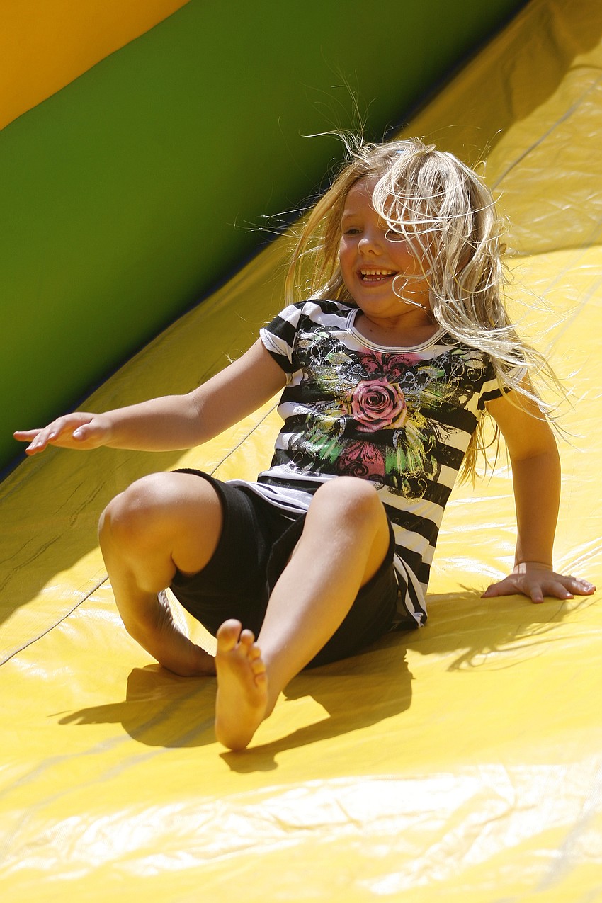 Charlotte Traugutt couldn't get enough of this slide.