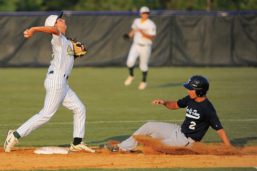 ODA senior Brendan Bercaw tries to break up Shorecrest Prep's attempt at a double play.