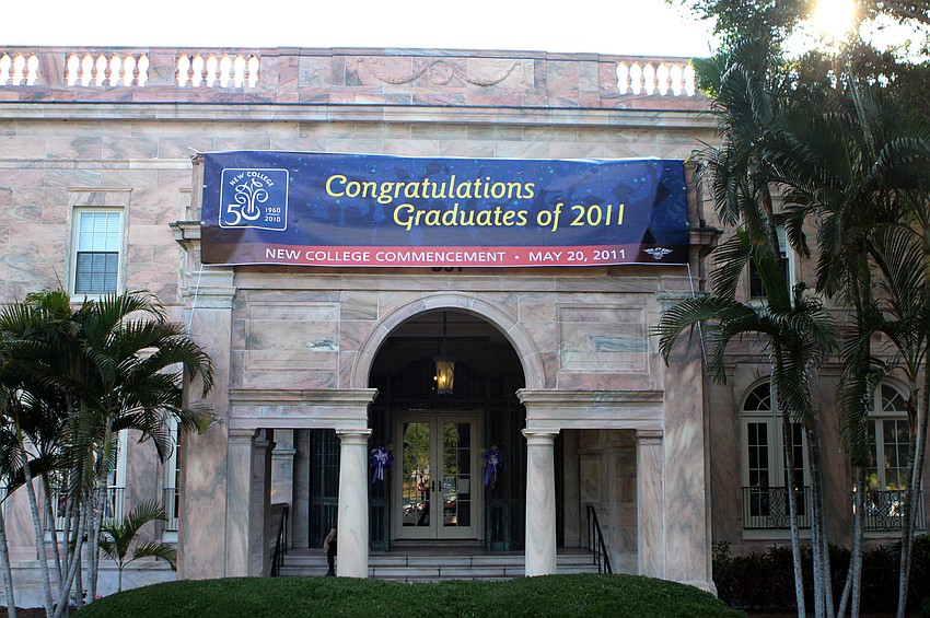 The front of New College's College Hall was decorated with a congratulatory banner Friday, May 20 at College Hall Bay Front.