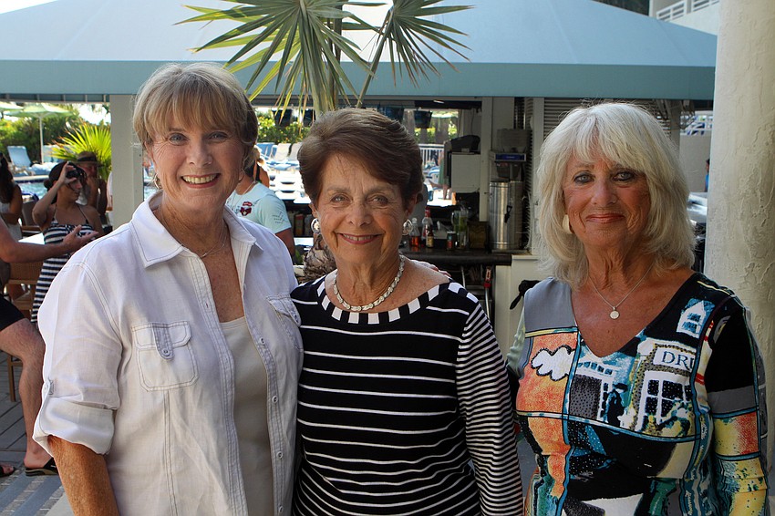 Joan Kiernan, Ronda Manasse and Joyce Hicks pose together before going to enjoy Longboat Key Club's BBQ and Movie night Saturday, May 28 at the Longboat Key Club hotel poolside.