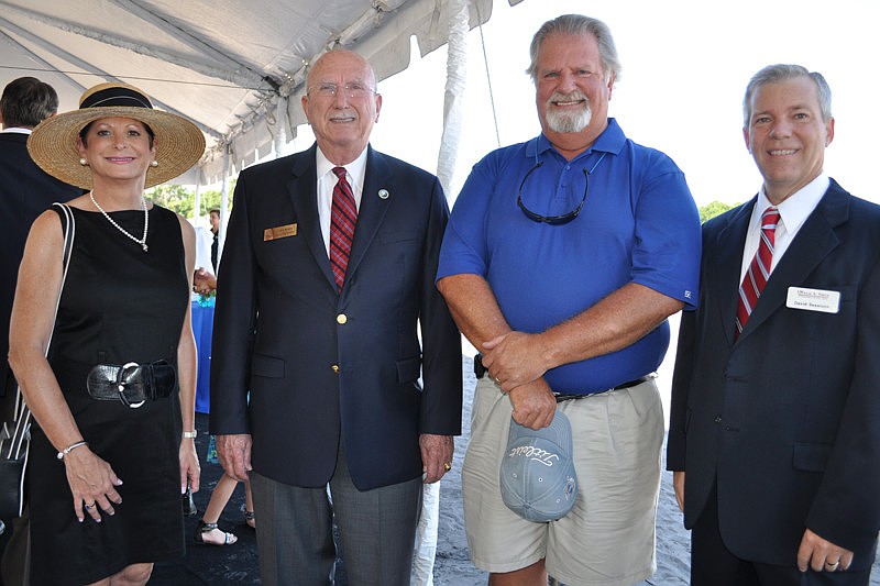 Manatee County Commissioners Robin DiSabatino and Larry Bustle caught up with Building Director John Barnott and Willis A. Smith Construction's David Sessions.