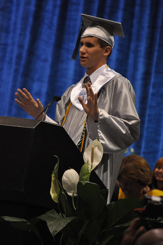 Alec Bacon kept the crowd laughing during his commencement speech involving an inflatable beach ball.