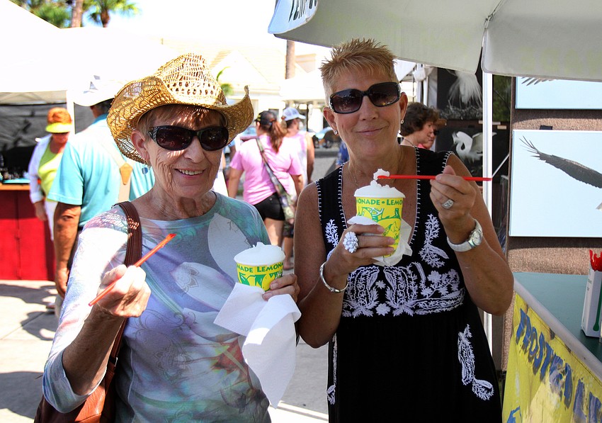 Marian Irwin and Julie McClintic, of Sun City, enjoy some frozen lemonades.