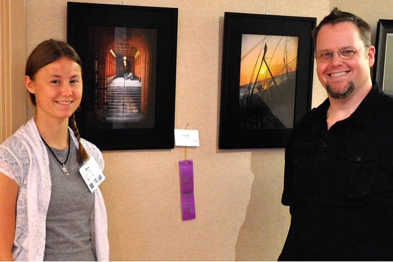 Braden River graduate Holly Neuhaus won a merit award at the art show. She is pictured with instructor Bill Ferrell.