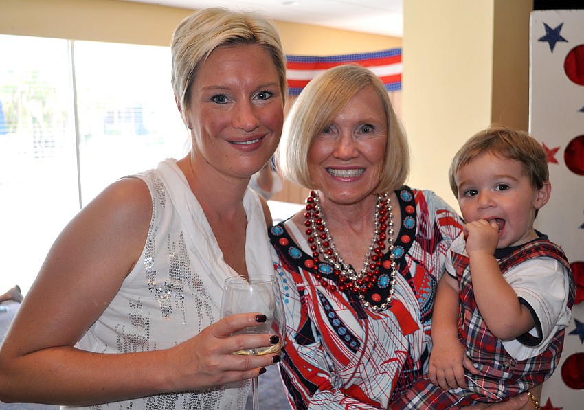 Jaime Beeler, Karen Jurgens and Carson Beeler, 16 mos., pose together Monday, July 4 at Bird Key Yacht Club.