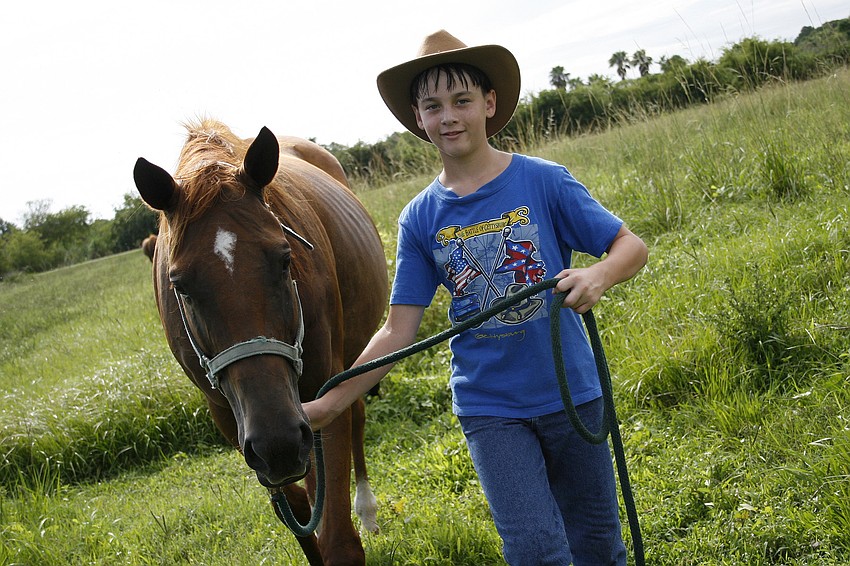 Collin Nicely, 11, is one of several boys at the camp this summer.