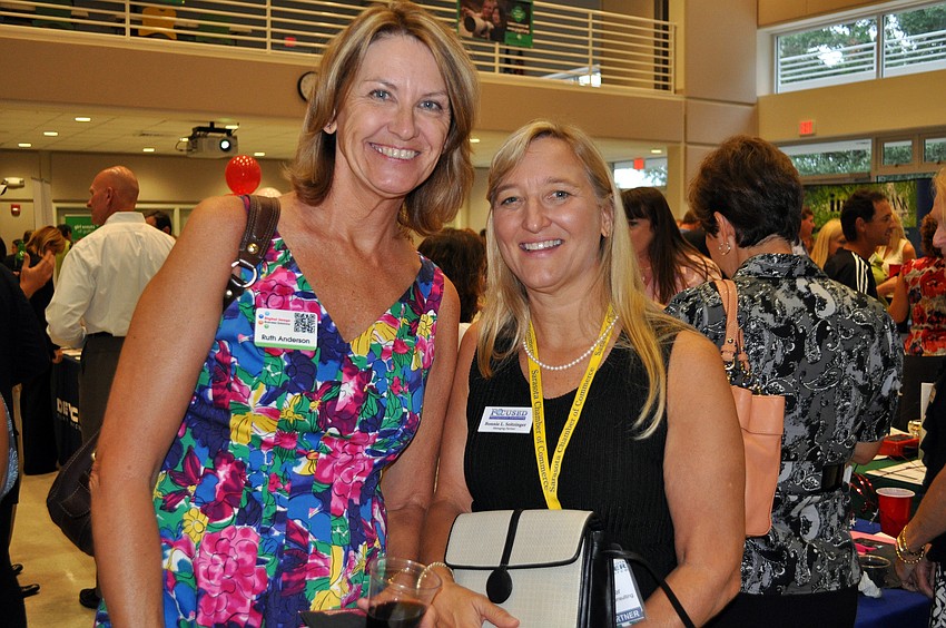 Ruth Anderson, of Digital Image Business Solutions, poses with Bonnie L. Seitzinger, of Focused Management consulting, Wednesday, July 13 at Sarasota Prime Time.