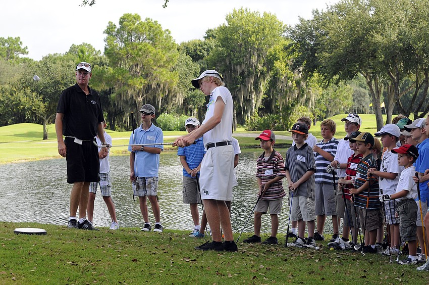 Lakewood Ranch High golfer Danny Walker demonstrates the proper way to hit a pitch shot.