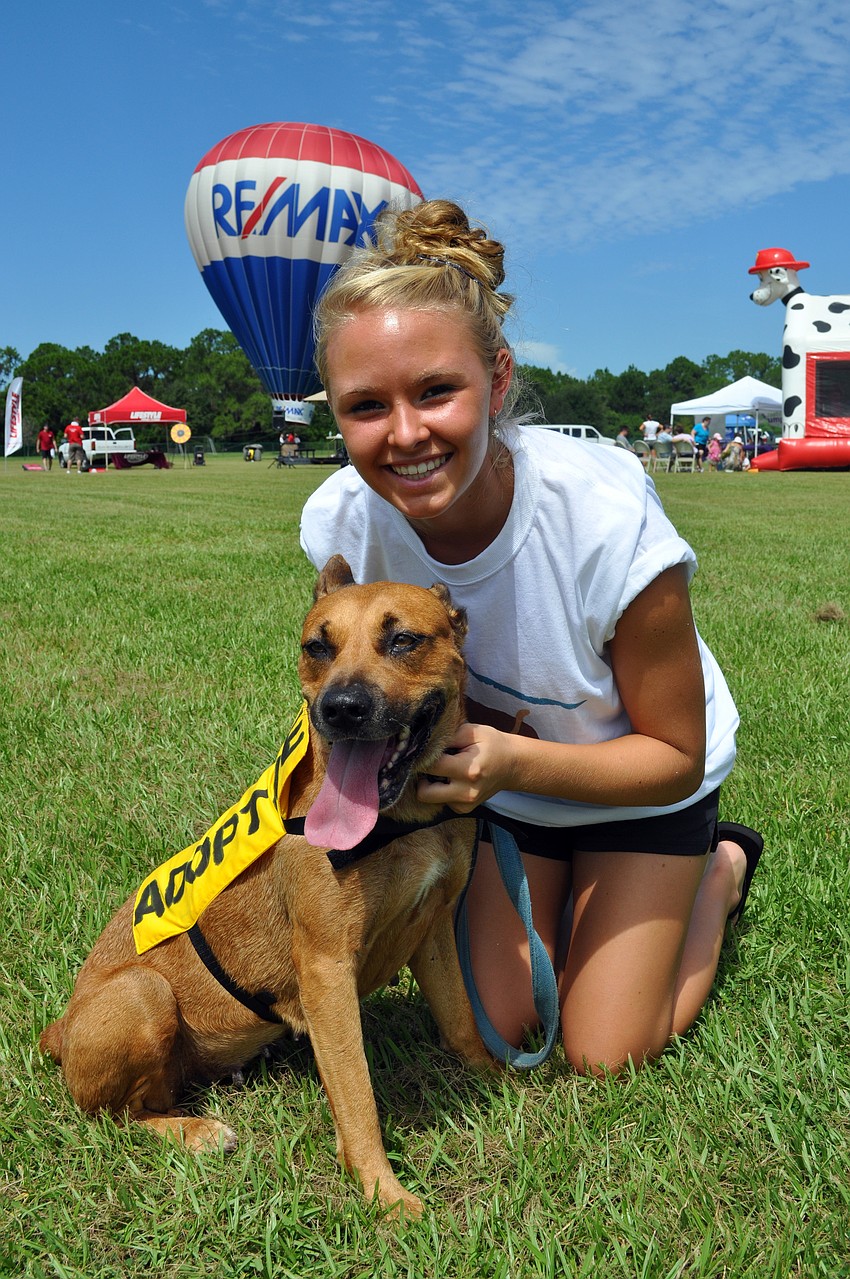 Nolan middle school eighth-grader Crystal Brown, pictured with Honey, a 6-year-old retriever and shepherd mix, volunteered her time.