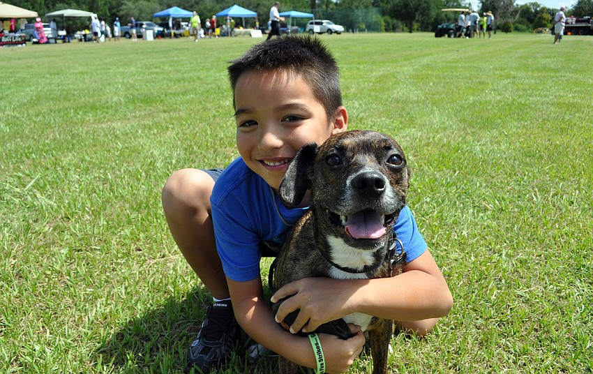 Seven-year-old Jayden Vilayvong came out with his dog Tako.