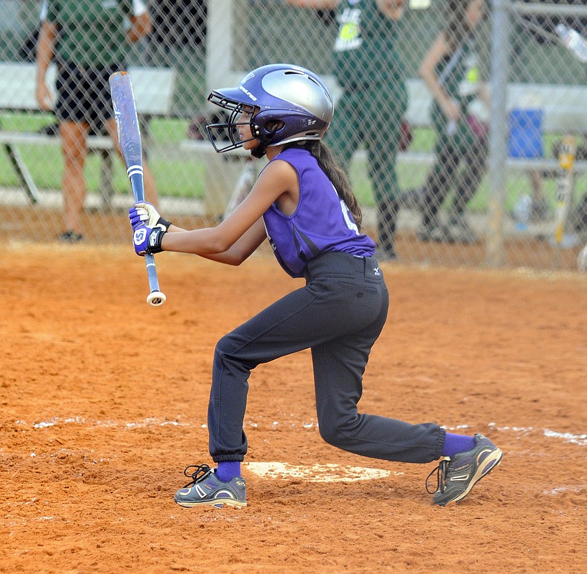 Tiffany Thomas attempts to bunt the ball during one of the Storm 01 teamâ€™s games.