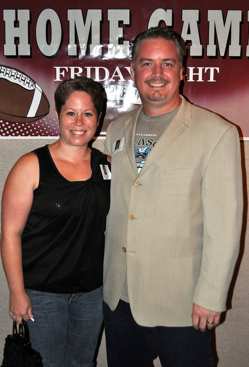 Dana (Saxon) Anderson and Matthew Anderson pose together at Riverviewâ€™s 20-year reunion Saturday, July 23 at Michaelâ€™s on East.